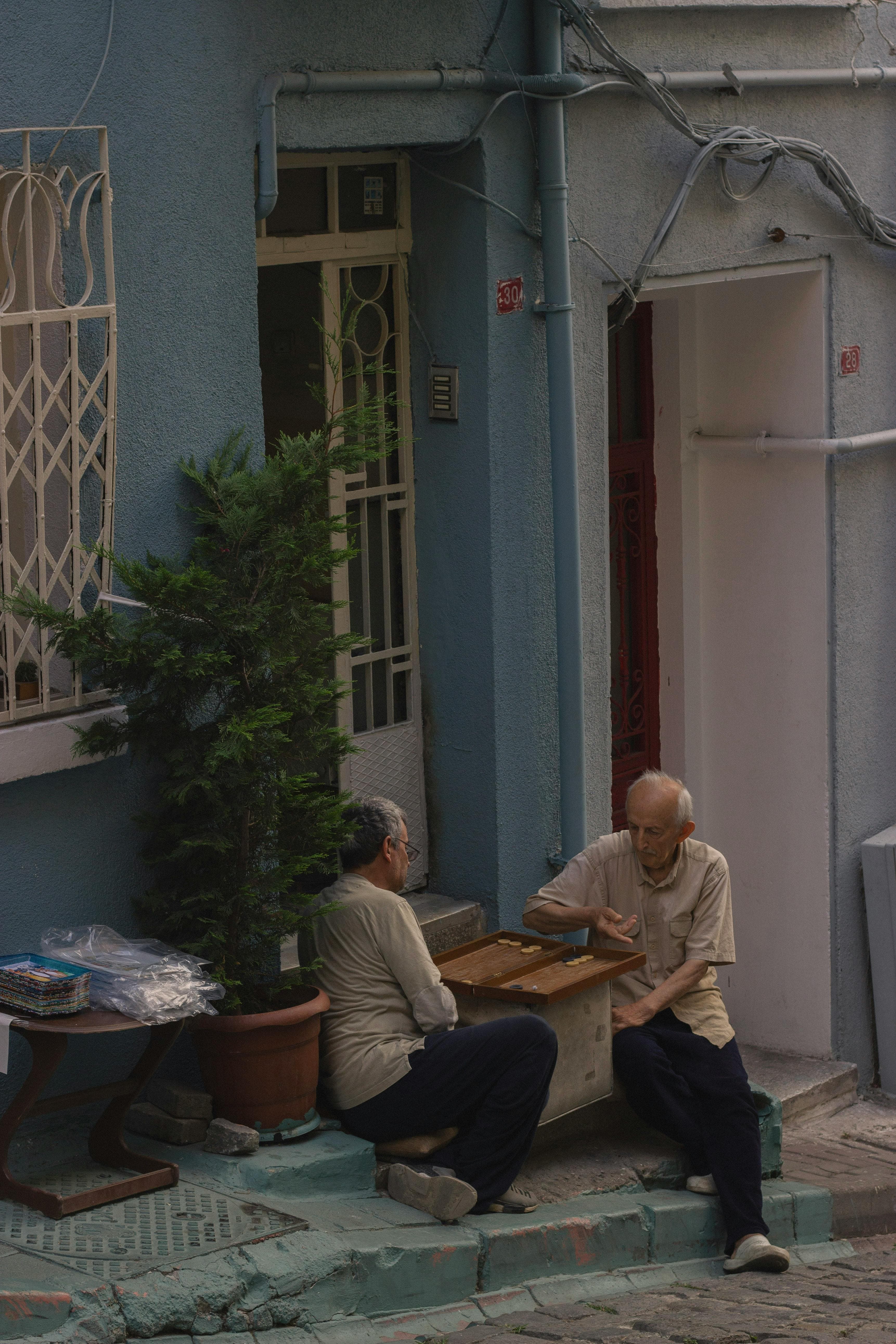 Two neighbours playing a board game